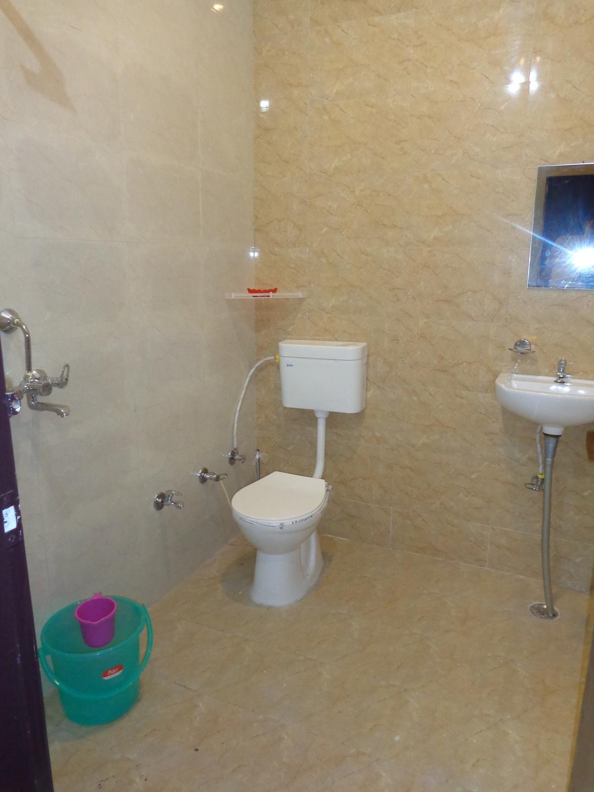 Clean attached bathroom at Indo Stay Boys PG Jaipur